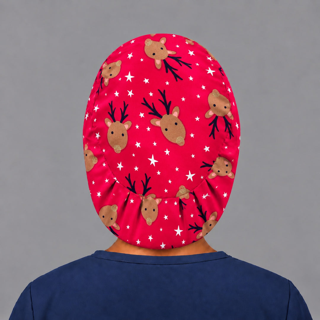 Back view of the Christmas reindeer Euro scrub cap — elastic gathered back showing reindeer and stars across the red crown