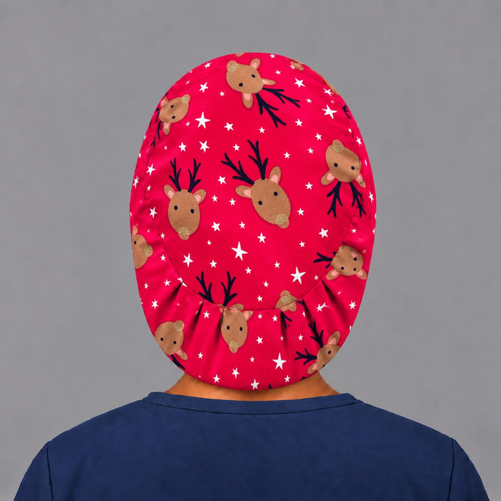 Back view of the Christmas reindeer Euro scrub cap — elastic gathered back showing reindeer and stars across the red crown