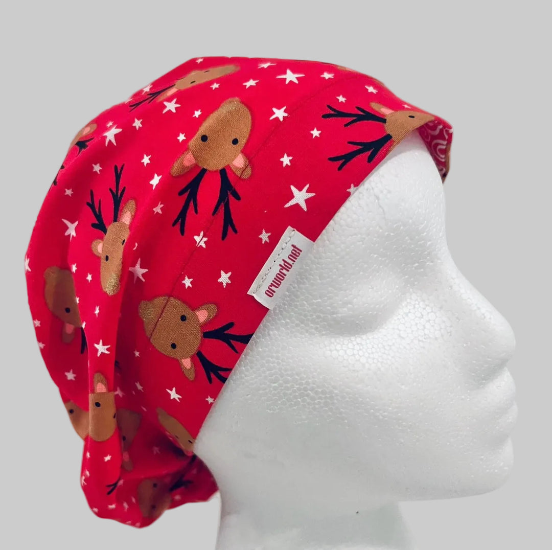Christmas reindeer euro scrub cap with adorable brown reindeer faces on a festive red background with white stars, handmade unisex surgical cap for nurses, surgeons, dental professionals, veterinarians, medical staff, holiday scrub hat gift, right side view