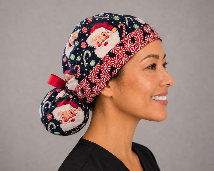 Christmas Santa ponytail scrub cap left side profile showing gathered ponytail pouch of vintage Santa faces and candy canes on navy with peppermint band and red ribbon tie