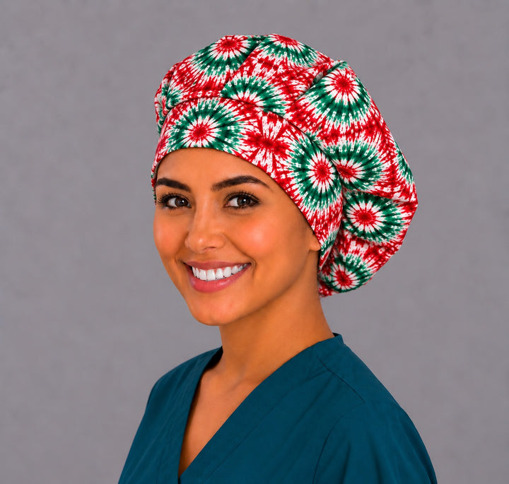 Christmas tie-dye bouffant scrub cap, left three-quarter view, red green and white starburst surgical hat for women