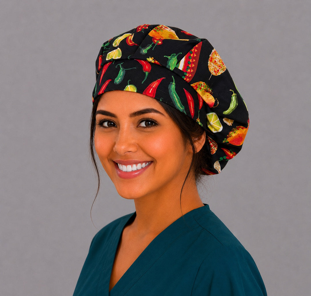 Cinco de Mayo fiesta bouffant scrub cap left three-quarter angle on smiling model showing tacos, chili peppers, limes and corn on black, women's Mexican food surgical hat OR World