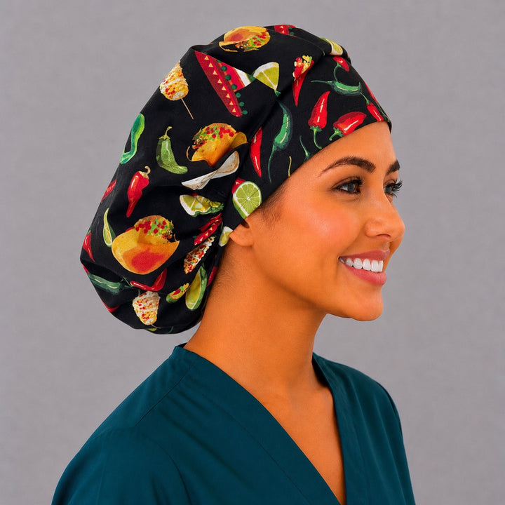 Cinco de Mayo fiesta bouffant surgical cap right side profile showing tacos, corn, limes and chili peppers on black, OR World Mexican food nurse hat