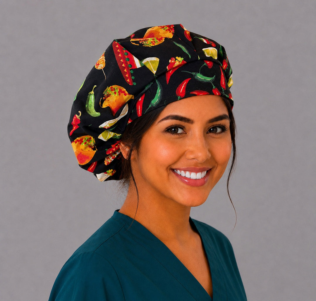Cinco de Mayo fiesta bouffant scrub cap right three-quarter angle on smiling model showing tacos, chili peppers and Mexican food on black, OR World nurse hat