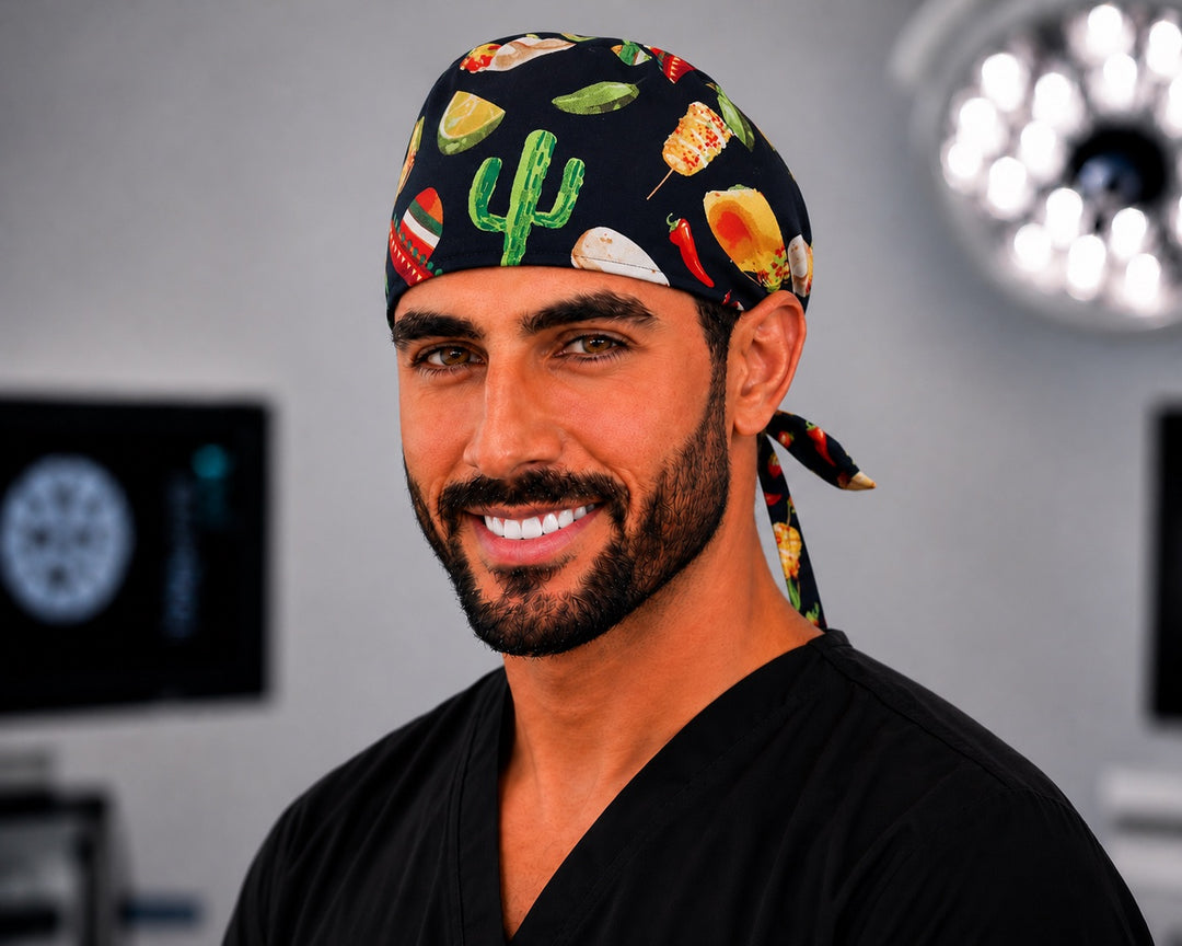 Cinco de Mayo fiesta Mexico scrub cap with tacos, cactus and chili peppers, handmade men's tie-back surgical hat on male OR nurse, front view