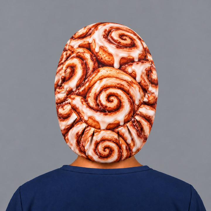 Back view of a cinnamon roll euro cap showing the gathered adjustable elastic back