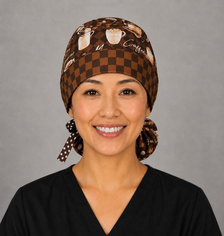 Brown coffee lover ponytail scrub cap back view close-up showing gathered pouch full of cappuccinos, mochas, lattes and coffee beans with brown polka dot grosgrain ribbon bow