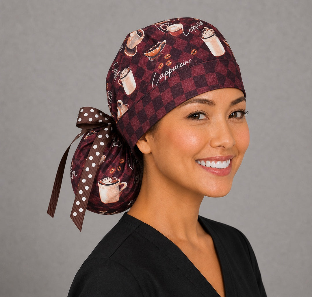 Brown coffee lover ponytail scrub cap right side view with full ponytail pouch of cappuccinos, lattes and coffee beans and long brown polka dot ribbon ties