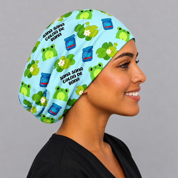 Side profile of a Colita de Rana Euro scrub cap showing the low-profile fit and frog print