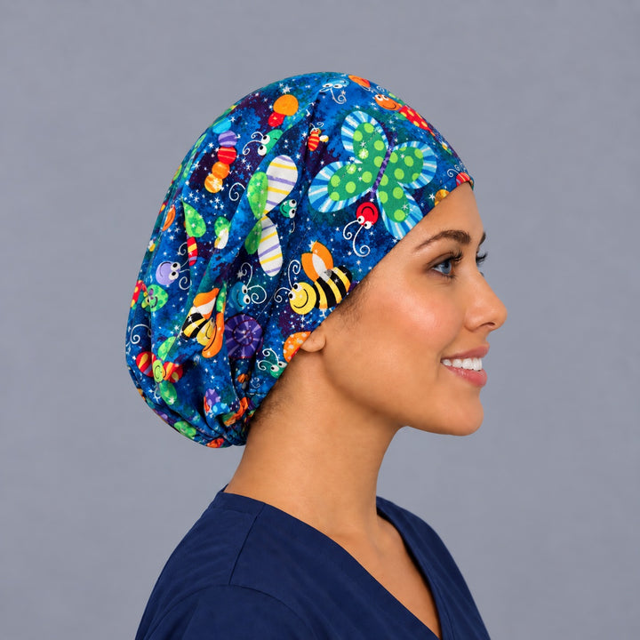 Right side profile of the colorful bug Euro surgical hat — polka-dot butterfly and caterpillar print, breathable cotton cap