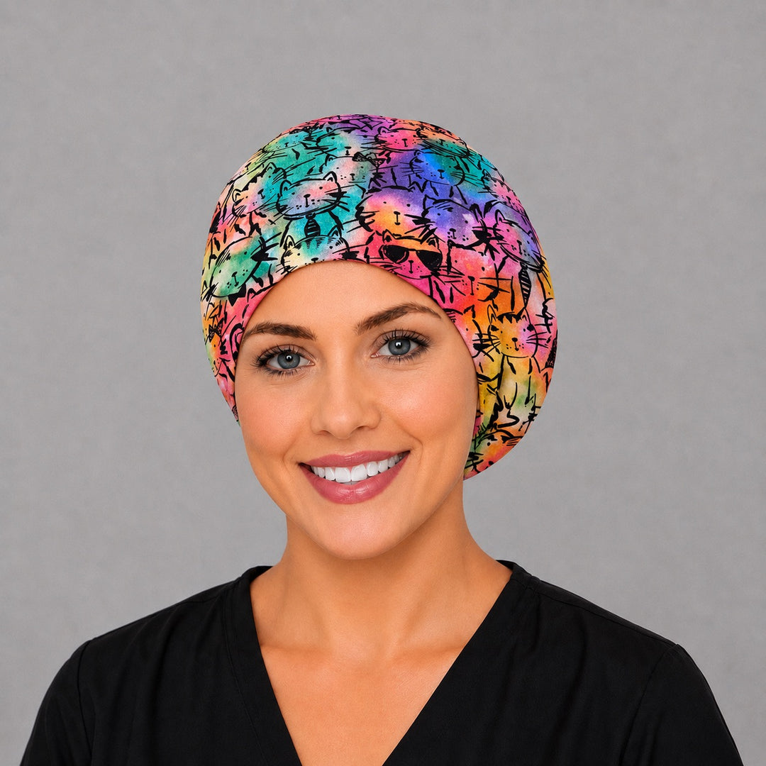 Right side profile of the colorful cat Euro surgical hat — tie-dye watercolor cat print, breathable cotton cap for nurses