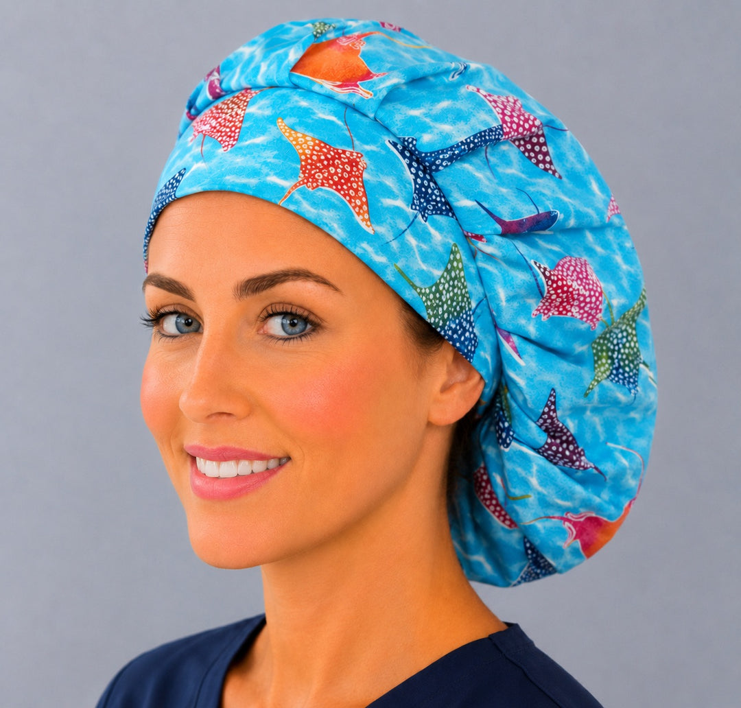 Colorful ocean ray bouffant surgical cap for women, three-quarter smiling view — vibrant stingray marine print bouffant scrub hat, breathable cotton