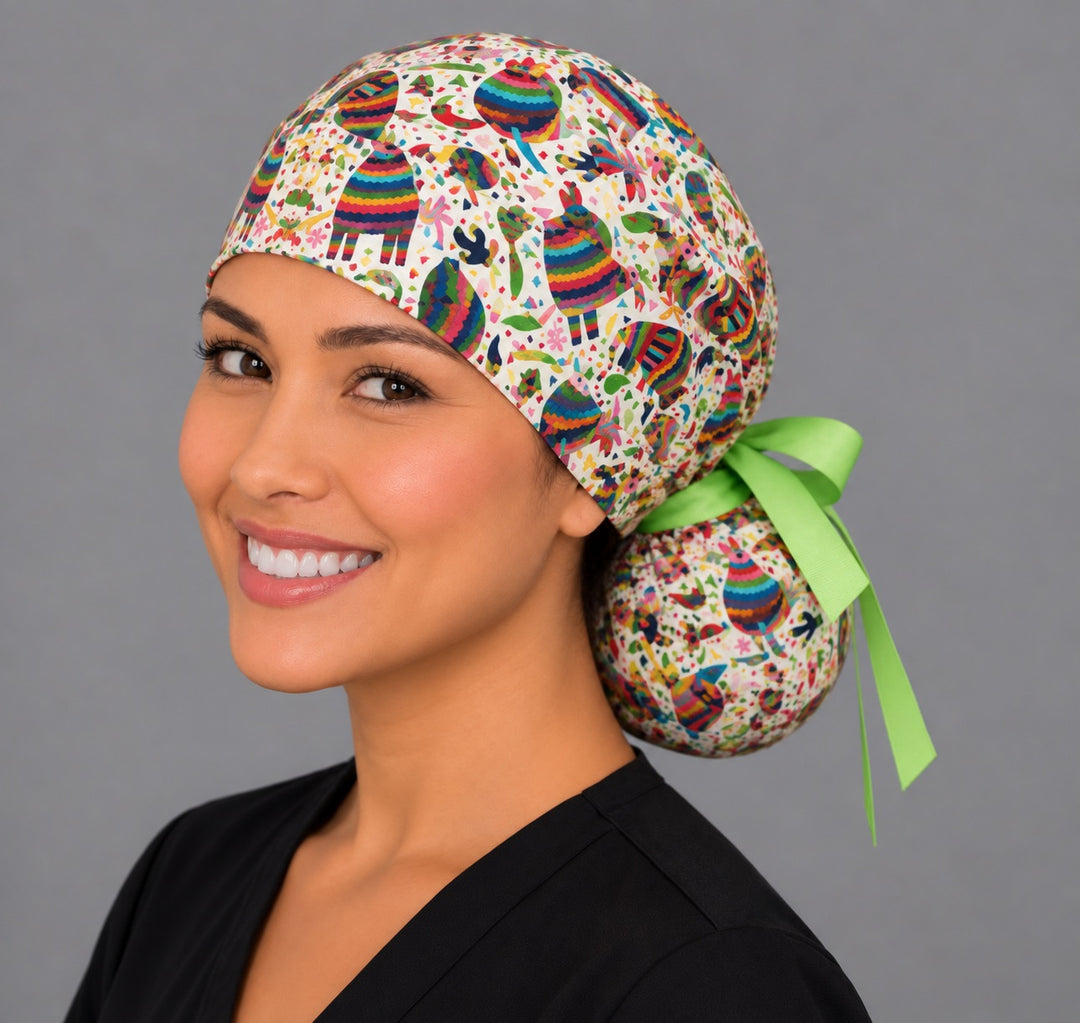 Colorful piñata ponytail scrub cap, right angled smiling view — rainbow donkey and star piñatas for OR nurses and surgical techs