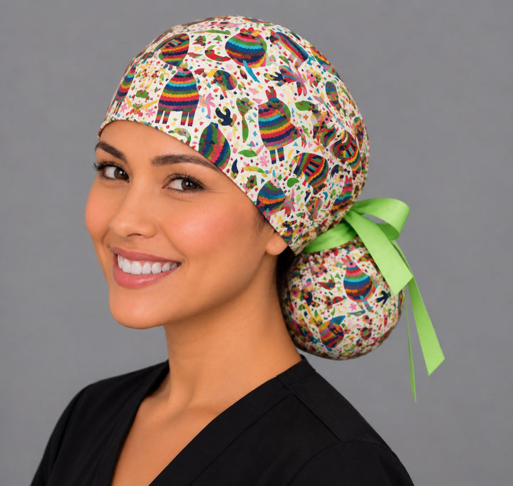 Colorful piñata ponytail scrub cap, right angled smiling view — rainbow donkey and star piñatas for OR nurses and surgical techs