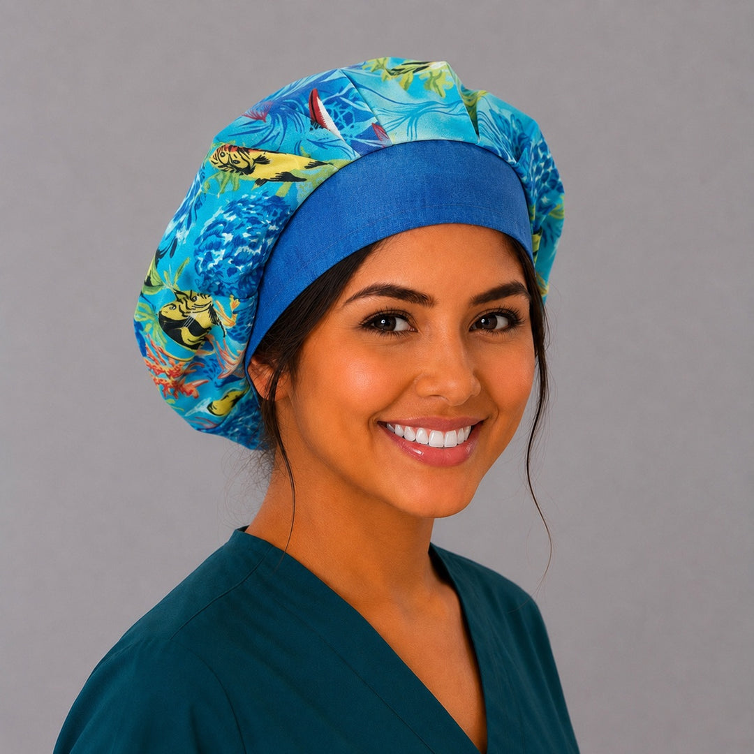 Colorful reef bouffant surgical cap for women, three-quarter smiling view — vibrant tropical ocean fish and coral bouffant scrub hat, breathable cotton