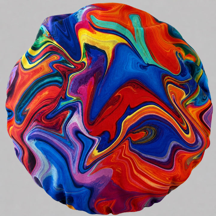 Close-up of colorful ripples rainbow marble ripple fabric — handmade-in-USA OR World bouffant surgical hat for women