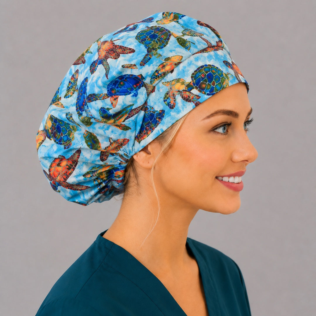 Colorful sea turtle Hawaiian bouffant scrub cap back view showing full ocean turtles print on watercolor blue, OR World surgical hat