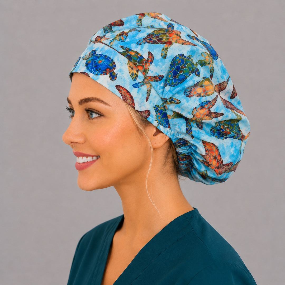 Colorful sea turtle Hawaiian bouffant scrub cap front view on smiling model, tropical ocean turtles print, women&