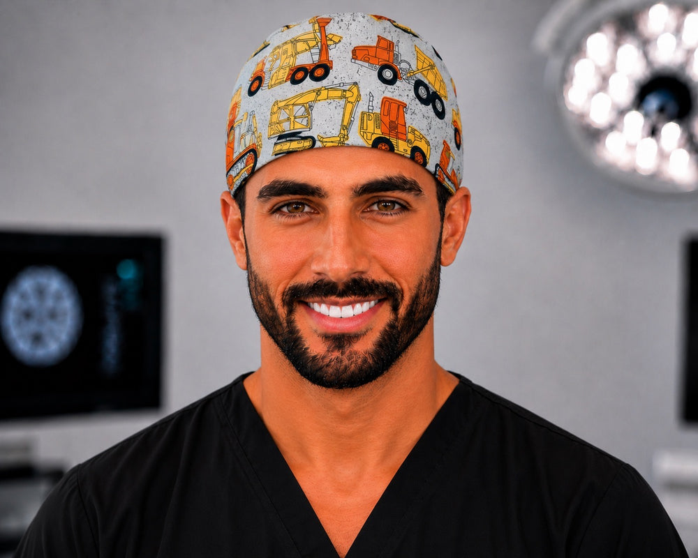 Construction trucks scrub cap with dump trucks and excavators, handmade men's tie-back pediatric surgical hat on male OR nurse, front view