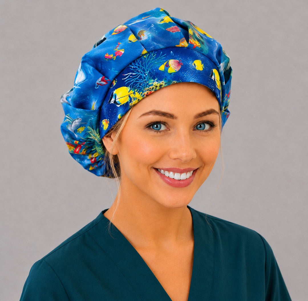 Coral reef bouffant surgical cap for long hair, front angled view — deep gathered fit that secures thick or voluminous hair