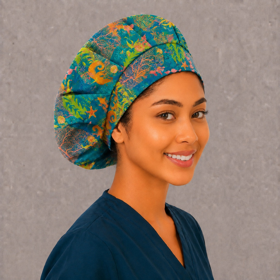 Coral reef bouffant surgical cap, three-quarter view — vibrant underwater print for OR nurses, surgical techs and vet teams