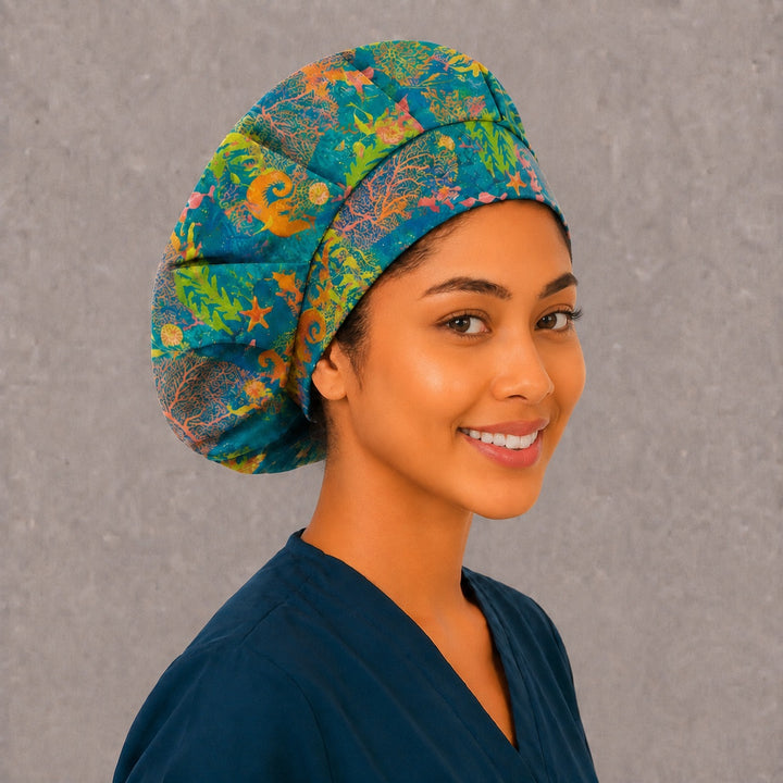 Coral reef bouffant surgical cap, three-quarter view — vibrant underwater print for OR nurses, surgical techs and vet teams
