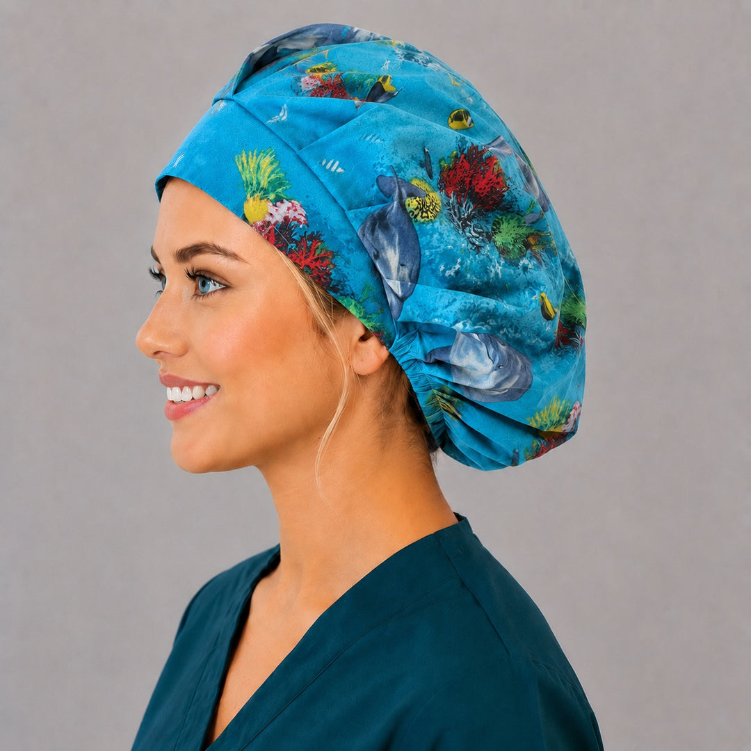 Coral reef dolphin bouffant cap for women, opposite side profile — sea life print, handmade cotton surgical cap, USA made