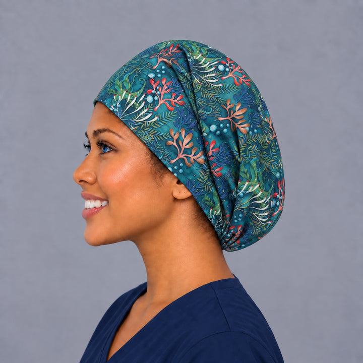 Coral and seaweed Euro cap, left side profile — handmade teal ocean surgical cap, USA made