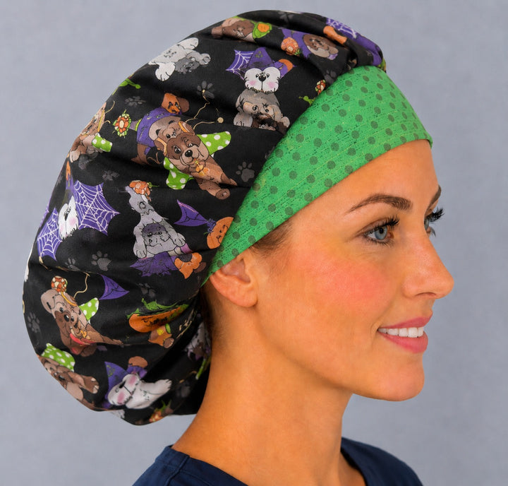 Right side profile of the costume dog bouffant surgical hat — spiderwebs, witch hats and fairy wings print, roomy breathable cotton cap for nurses