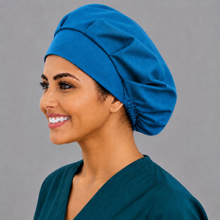 Country blue bouffant scrub cap, left side profile — deep gathered fit that secures long thick or braided hair