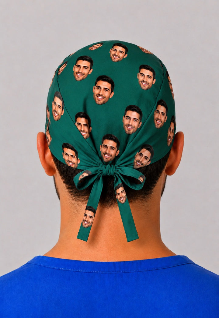 Back of emerald green personalized face photo scrub cap with tie-back fit — custom scattered face surgical hat for OR teams, handmade in the USA.