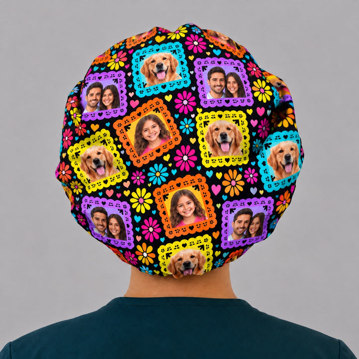 Back view of the custom photo bouffant cap, showing the full round crown tiled with dog, child and couple photos in rainbow papel picado frames