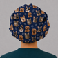 Custom photo scrub cap — personalized photo bouffant surgical hat for women, navy with example pet photos, back view with room for long hair, handmade-in-USA OR World.