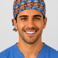 Custom photo scrub cap in face-collage style on a male model — personalized surgeon photo surgical hat, handmade in the USA by OR World.