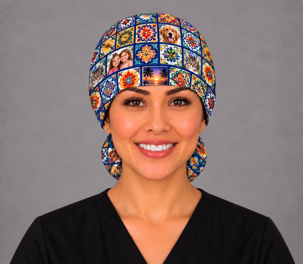 Smiling nurse in black scrubs wearing a custom photo Talavera ponytail scrub cap, front view with dog, kids and palm tree sunset photo tiles across the forehead band