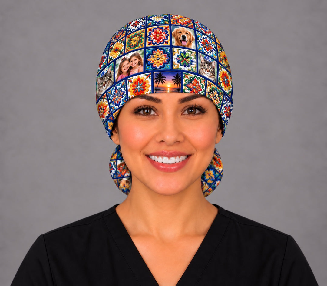 Smiling nurse in black scrubs wearing a custom photo Talavera ponytail scrub cap, front view with dog, kids and palm tree sunset photo tiles across the forehead band