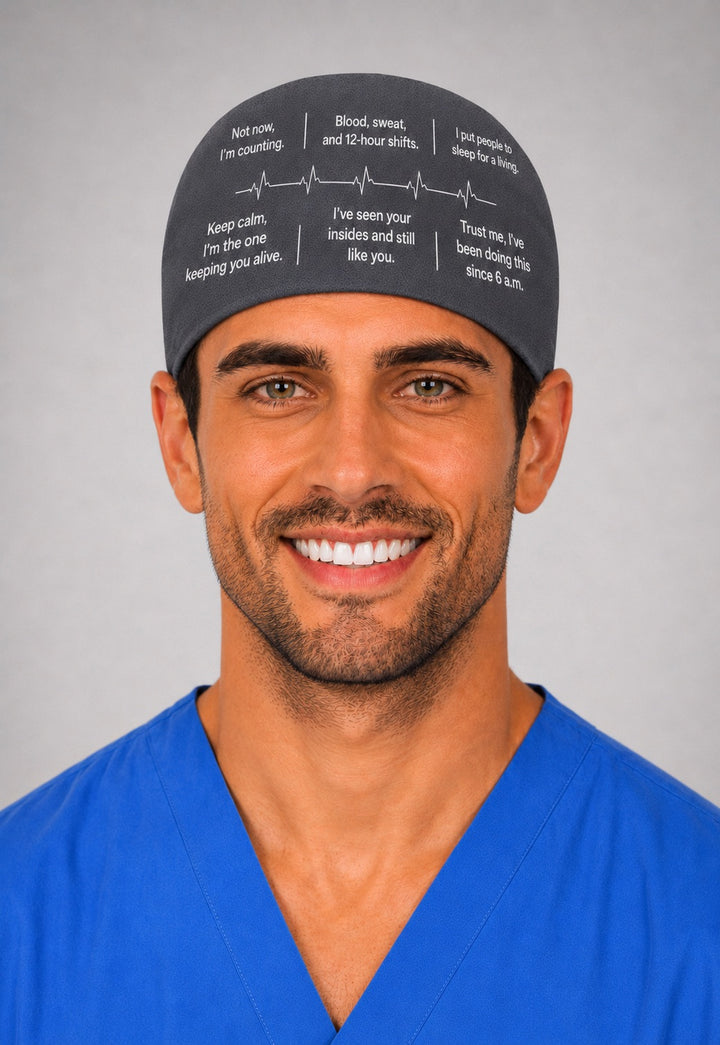 Back view of custom quote scrub cap in charcoal gray showing tie back bow and funny personalized medical sayings wrapping the whole cap, your own words custom text surgical hat for men, handmade in USA gift for surgeons and OR teams, OR World