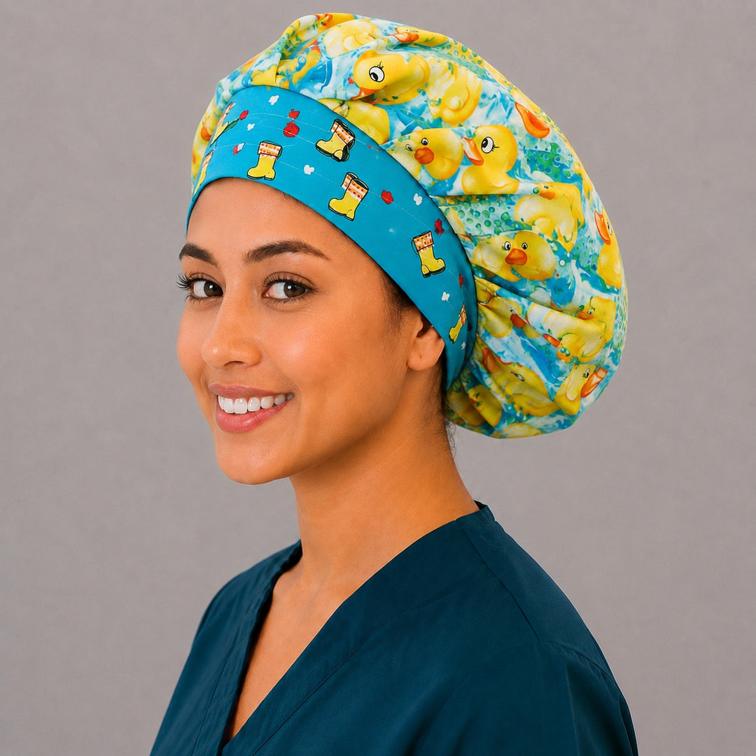 Cute duckling bouffant surgical cap for long hair, left angled view — deep gathered fit for OR and pediatric teams