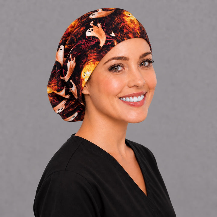Cute Halloween ghost Euro scrub cap, right angled smiling view — red autumn branch print for OR nurses and surgical techs