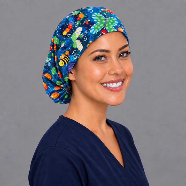 Cute insect Euro surgical cap, left angled view — elastic adjustable back that secures long or thick hair