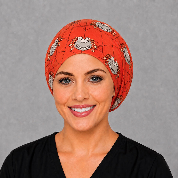 Cute monster spider Euro cap for women, right angled smiling view — handmade Halloween surgical cap, USA made