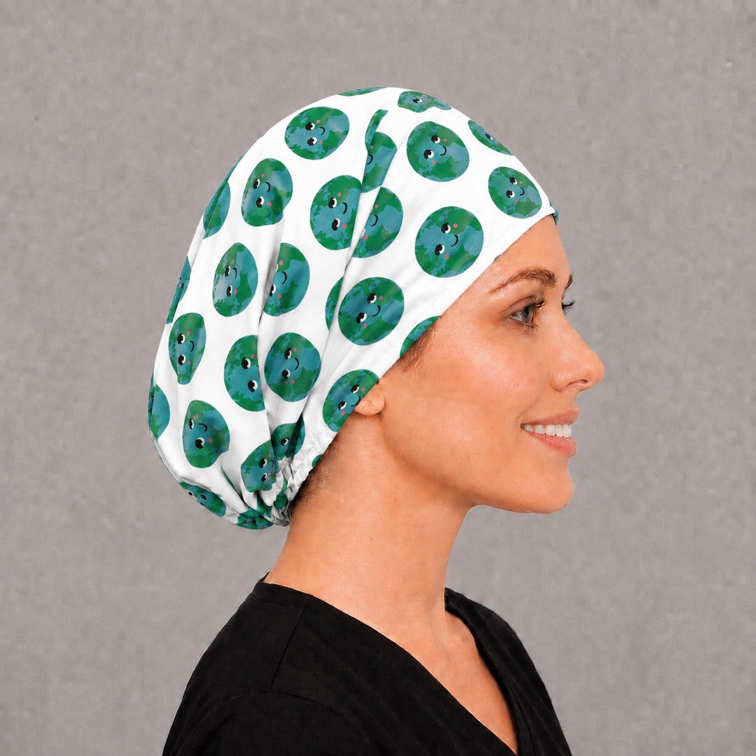 Right side profile of the cute planet earth Euro surgical hat — smiling globe print, breathable cotton cap for OR nurses