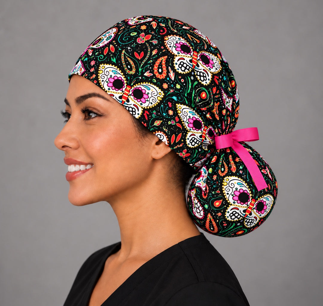 Left profile of the Day of the Dead butterfly ponytail hat, flat front band and roomy pouch for thick or curly hair, women-owned OR World