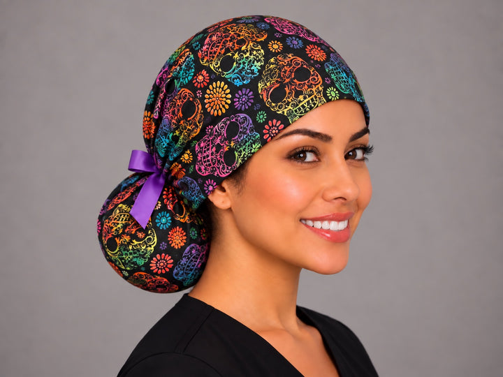 Day of the Dead ponytail scrub cap, right three-quarter view, gorro quirúrgico de calaveritas arcoíris, handmade in USA