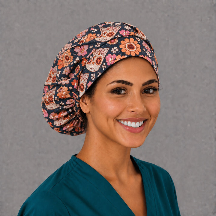 Right side profile of the Día de los Muertos cat bouffant surgical hat — folk-art calavera cats on navy, roomy breathable cotton cap for nurses