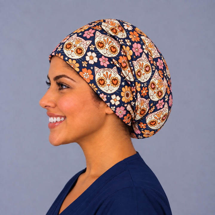 Left profile of the Día de los Muertos cat Euro cap, smooth fitted crown for OR nurses, CRNAs and vet techs