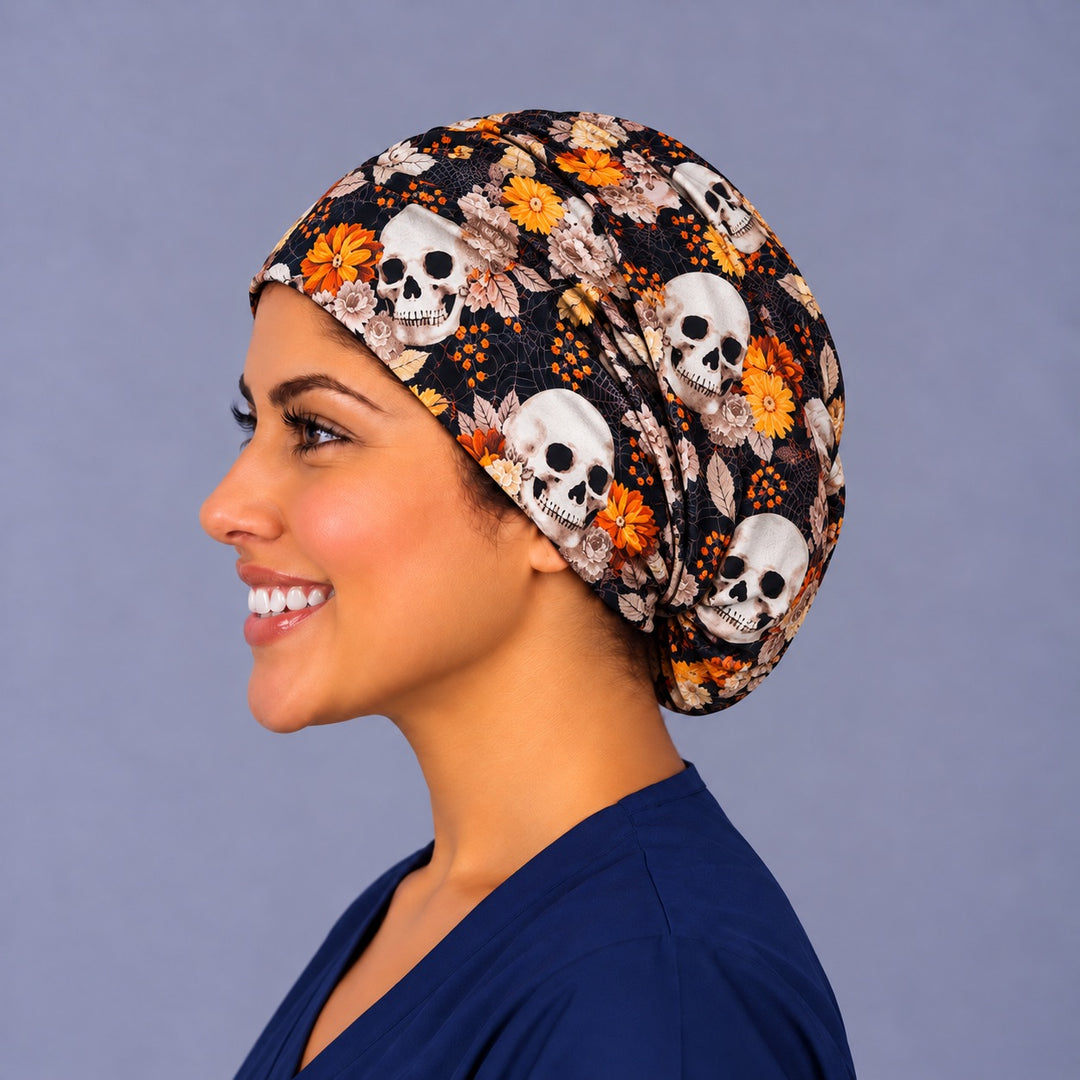 Opposite side profile of a Día de los Muertos euro OR cap in 100% cotton, with golden marigolds and skulls along the deep crown
