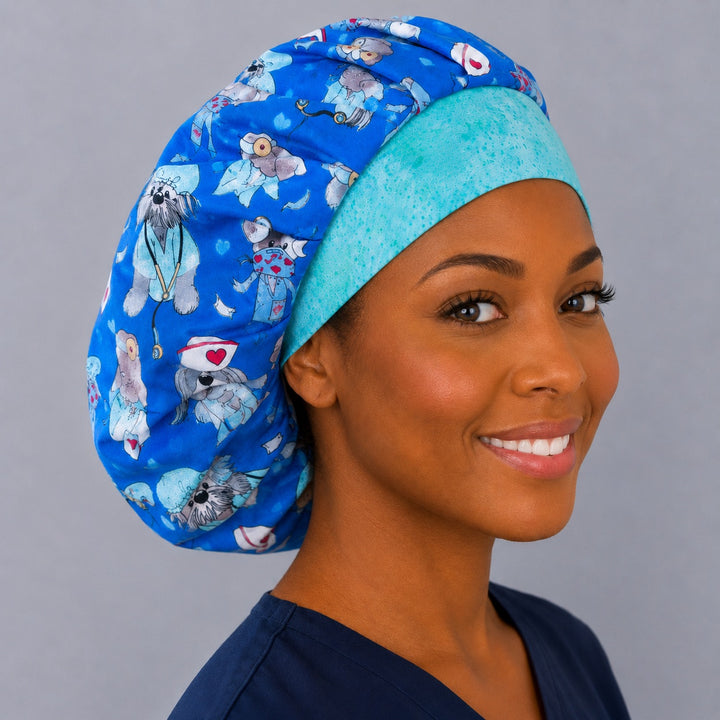 Dog doctor print bouffant cap for women, angled smiling view — handmade blue puppy scrubs print surgical cap, USA made