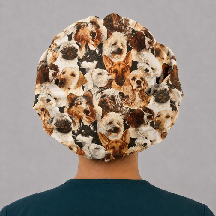 Dog lovers bouffant scrub cap back view showing full collage of realistic dog breeds — shepherd, collie, pug, husky, retriever — OR World vet surgical hat
