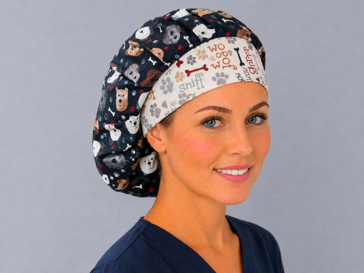Dog print bouffant cap for women, angled smiling view — paw print band and puppy faces, handmade cotton surgical cap, USA made